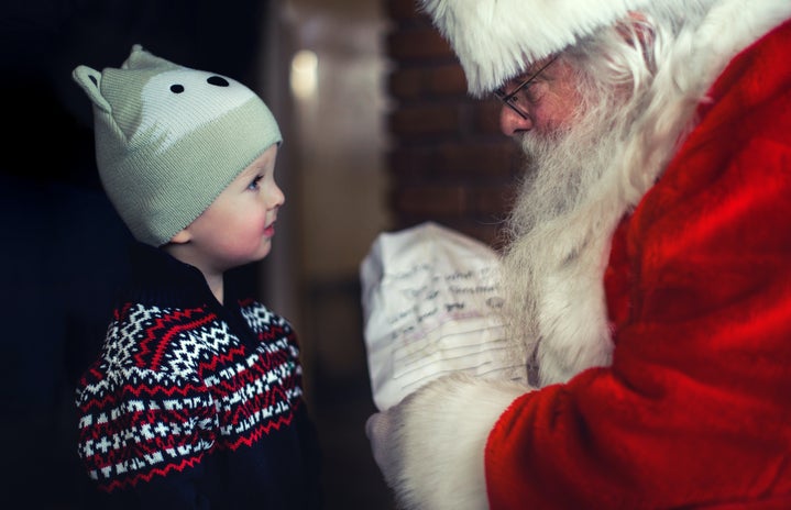 Santa and young boy by Mike Arney?width=719&height=464&fit=crop&auto=webp