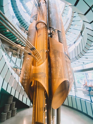 view of design element in spiral escalator of starbucks reserve roastery chicago