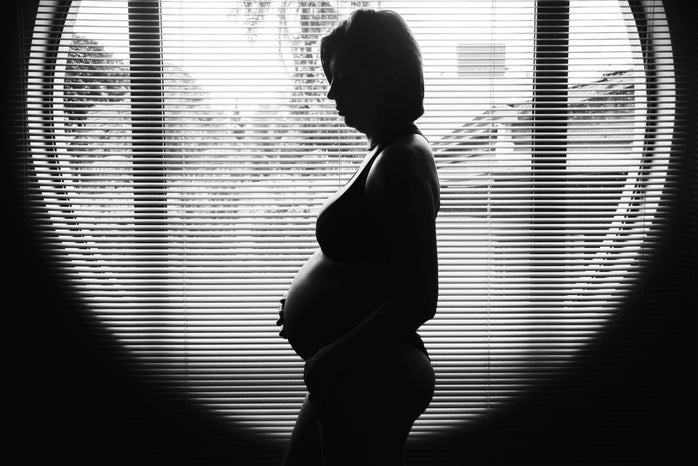 Silhouetted baby bump by Unsplash?width=698&height=466&fit=crop&auto=webp