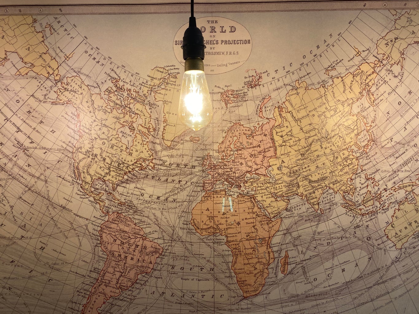 World map in IKEA under a light bulb