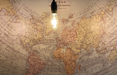 World map in IKEA under a light bulb