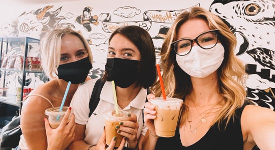 Selfie of 3 girls with coffee