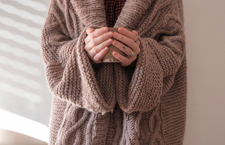 warm cup of coffee and giant sweater by Giulia Bertelli on Unsplash?width=719&height=464&fit=crop&auto=webp