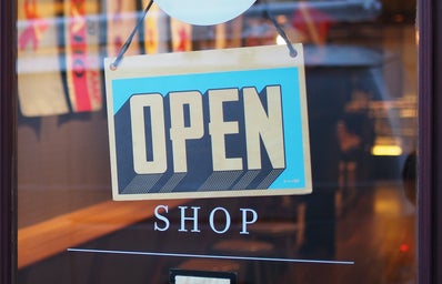 Open sign in store front