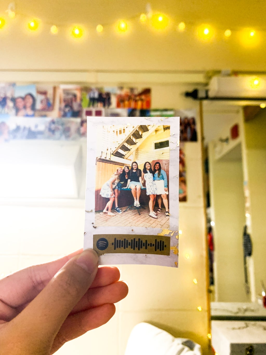 Holding DIY Spotify Polaroid