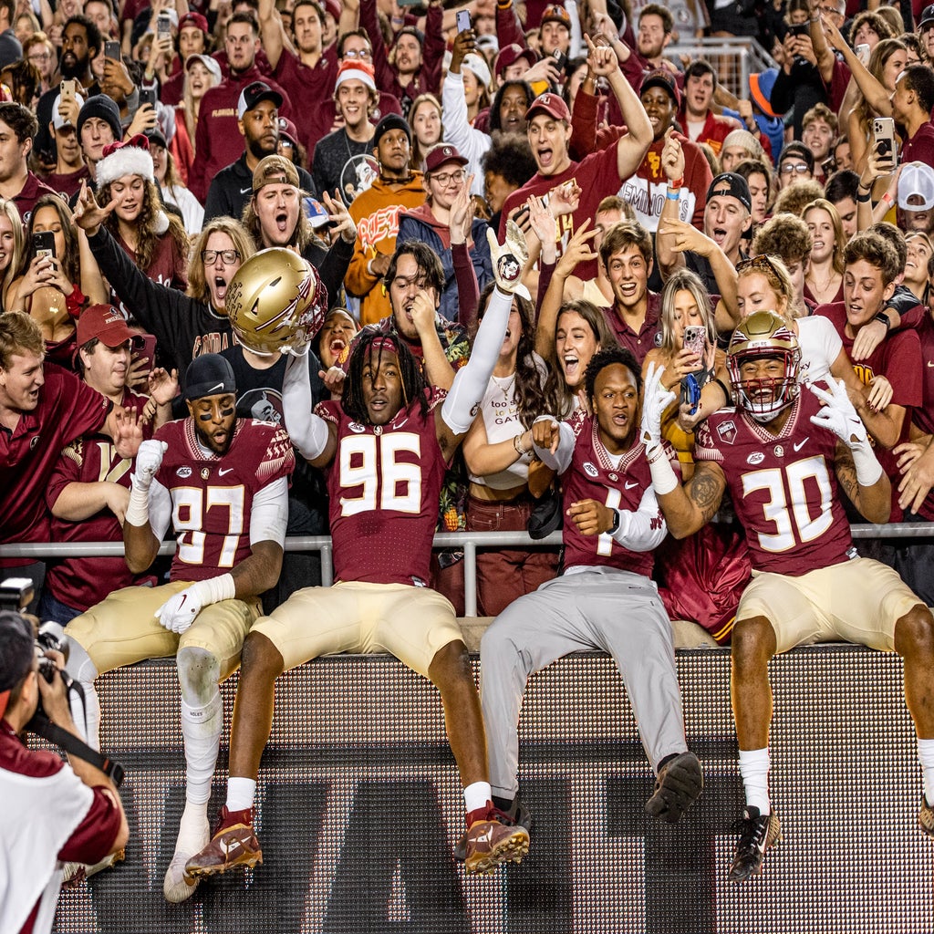 FSU football players celebrating their win