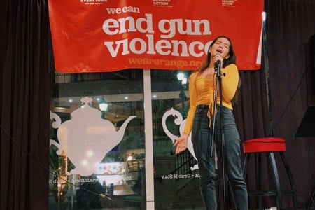 Juliana Simone Carrasco singing at we can end gun violence.