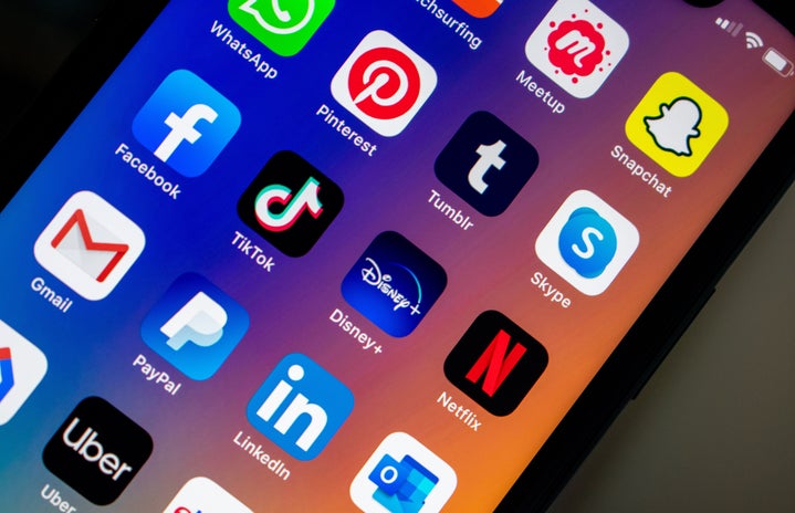 phone screen closeup with social media apps
