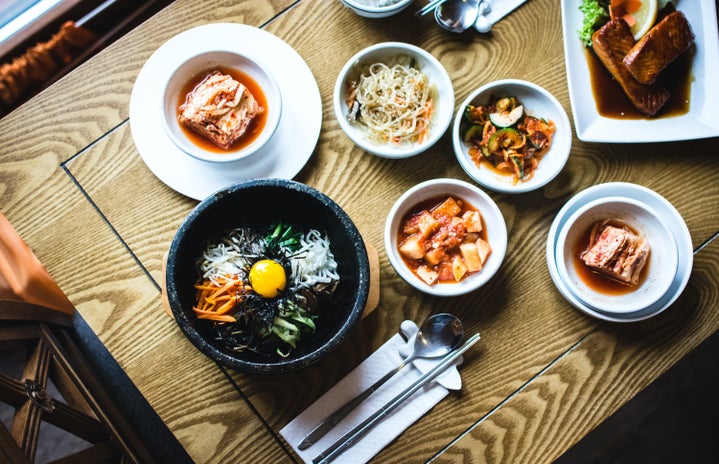Korean Food Bibimbap with Kimchi by Jakub Kapusnak on Unsplash?width=719&height=464&fit=crop&auto=webp