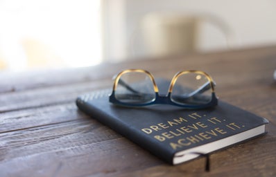 Journal with glasses