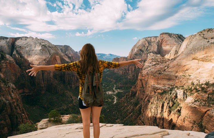 woman hiking zion national park?width=719&height=464&fit=crop&auto=webp