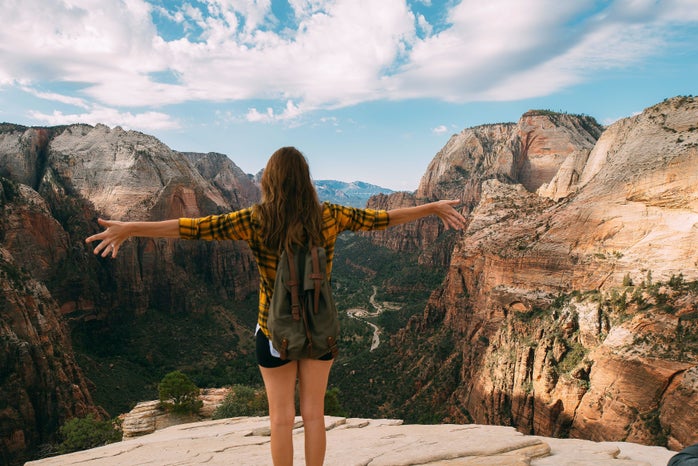 woman hiking zion national park?width=698&height=466&fit=crop&auto=webp