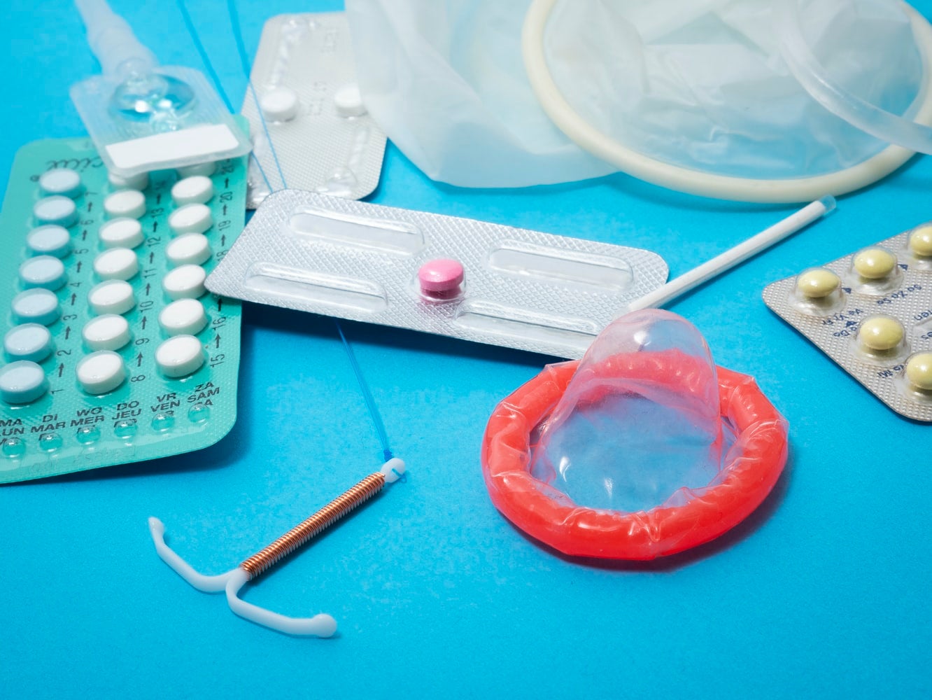 Reproductive health supplies set out on surface.