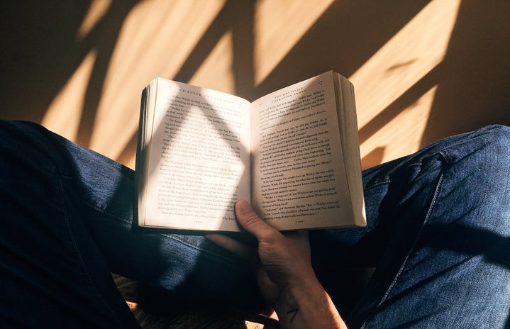 hand holding book open