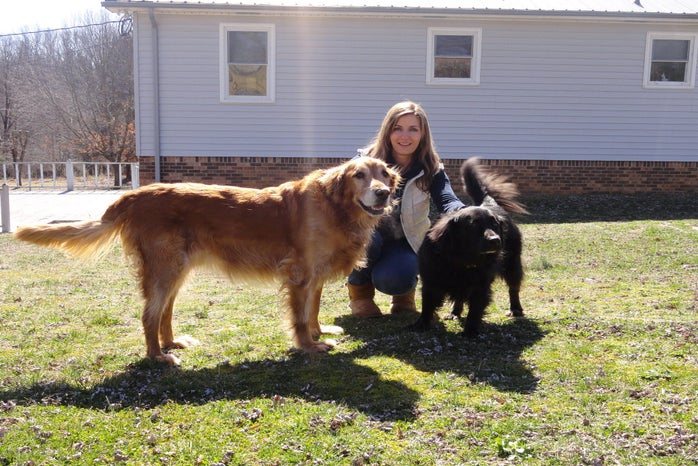 Anna Flores with dogs outdoors by Kyla Roginski?width=698&height=466&fit=crop&auto=webp