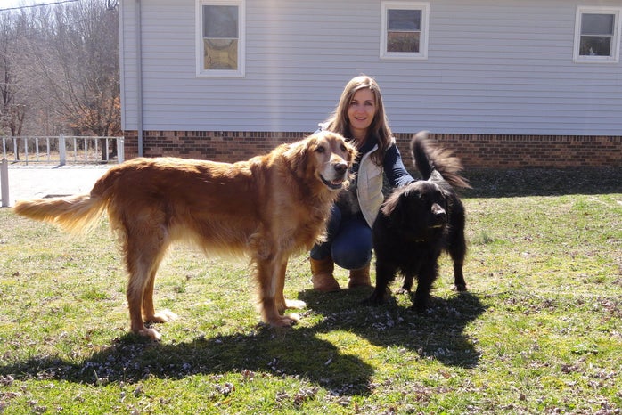 Anna Flores with dogs outdoors by Kyla Roginski?width=698&height=466&fit=crop&auto=webp