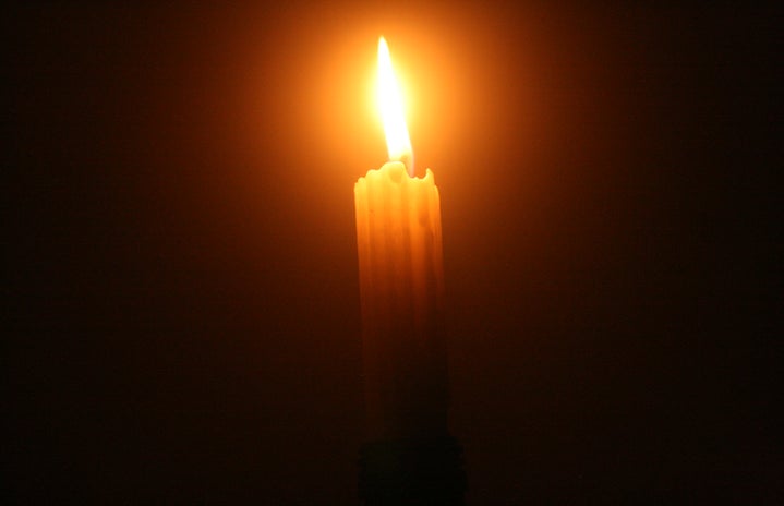An image of a candle in the dark by Luvo Theo Duntsu?width=719&height=464&fit=crop&auto=webp