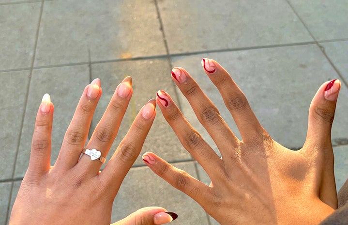 a picture of two girls\' hands