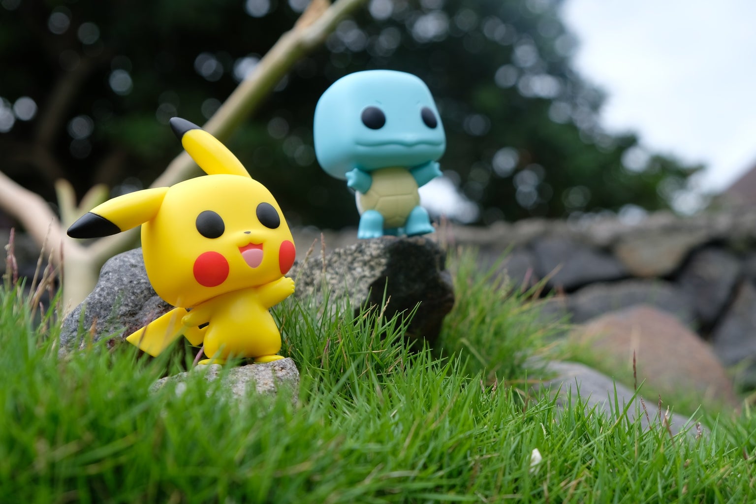 pokémon pop figures in the grass