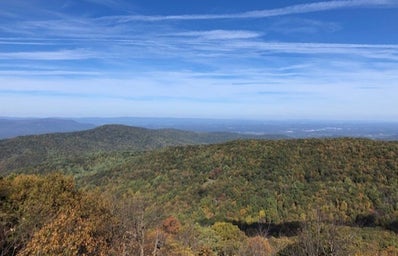 view from the top of a mountain during fall