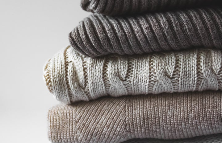 knit sweater stack by Tijana Drndarski via Unsplash?width=719&height=464&fit=crop&auto=webp