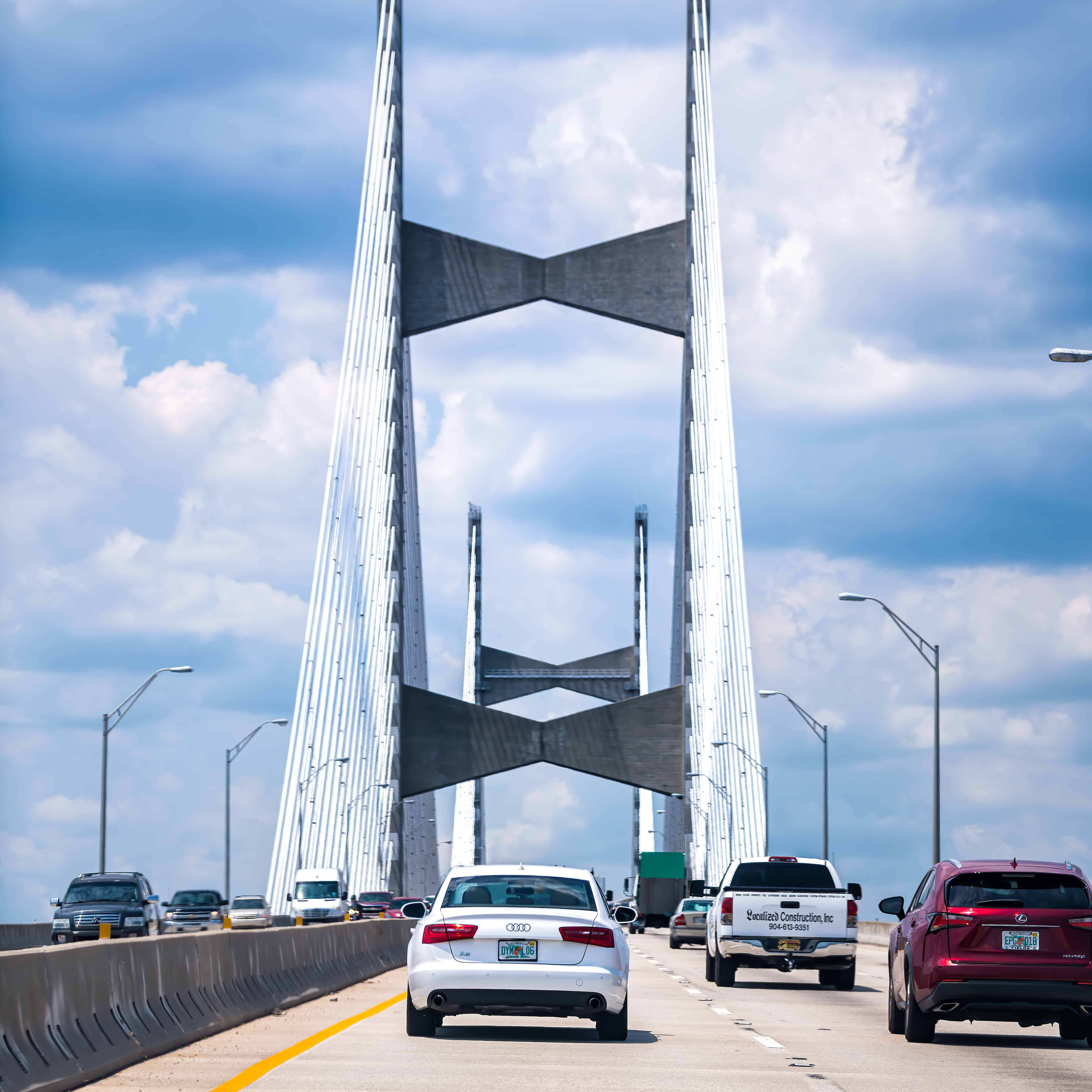 Cars on Dames Point or Napoleon Bonaparte Broward suspension cable-stayed bridge over St. Johns River in Florida Interstate 295 East Beltway