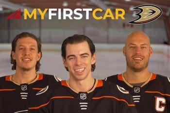 3 Anaheim Ducks players smiling with “My First Car” across the top