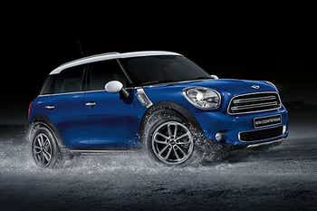 Blue four door mini cooper