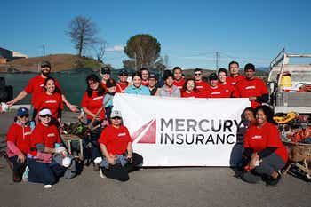 Mercury Insurance employees taking a picture for habitat for humanity
