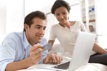 Husband and wife buying auto insurance online
