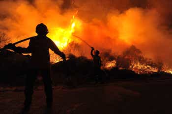 Firefighters fighting a blaze