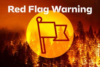 Red flag warning art over a forest on fire