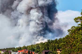 Wildfire smoke near houses