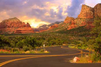 Winding road with red mountains in Sedona Arizona