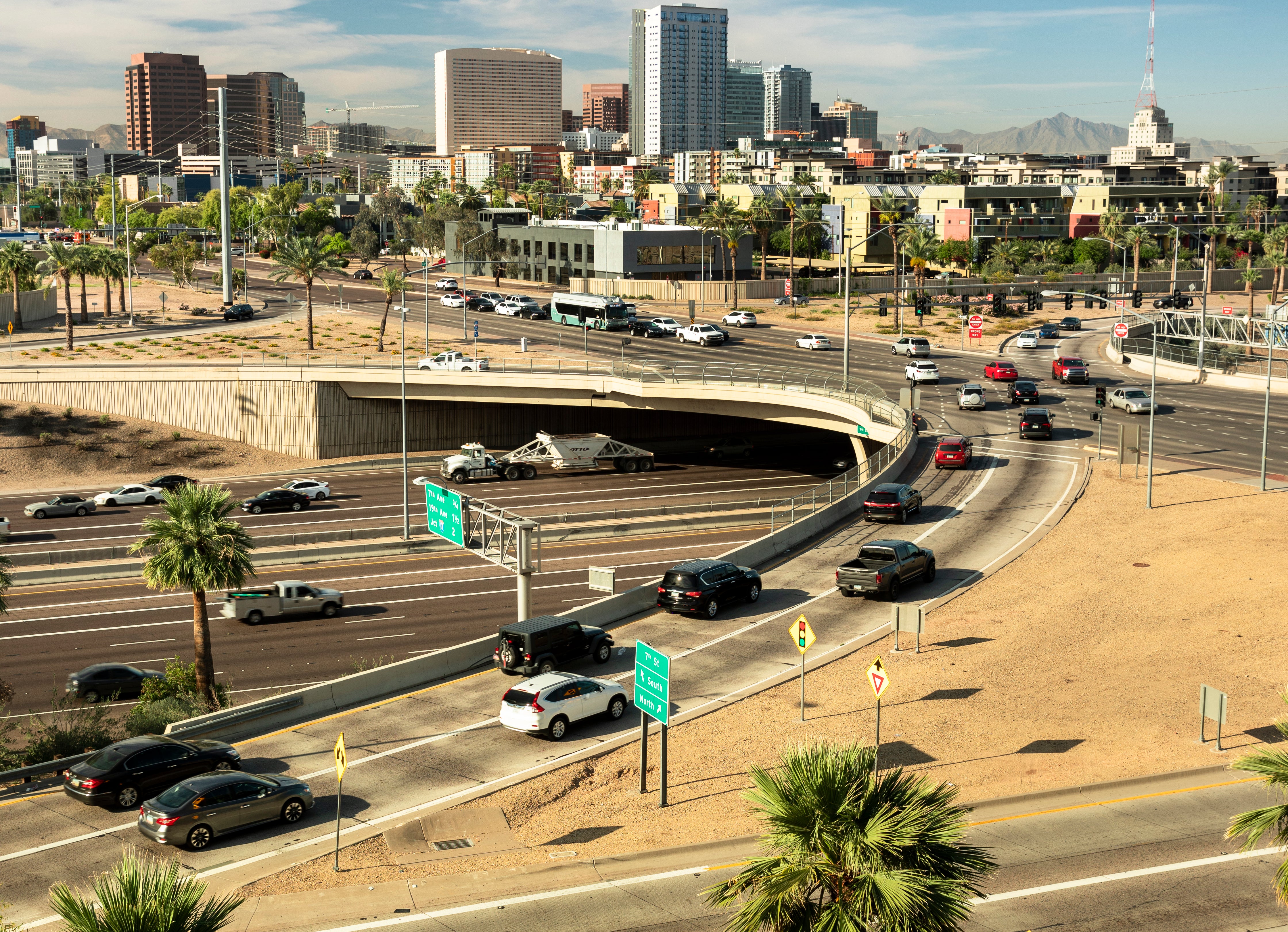 Rush hour traffic jam and cityscape skyline in the city core of Phoenix Arizona USA