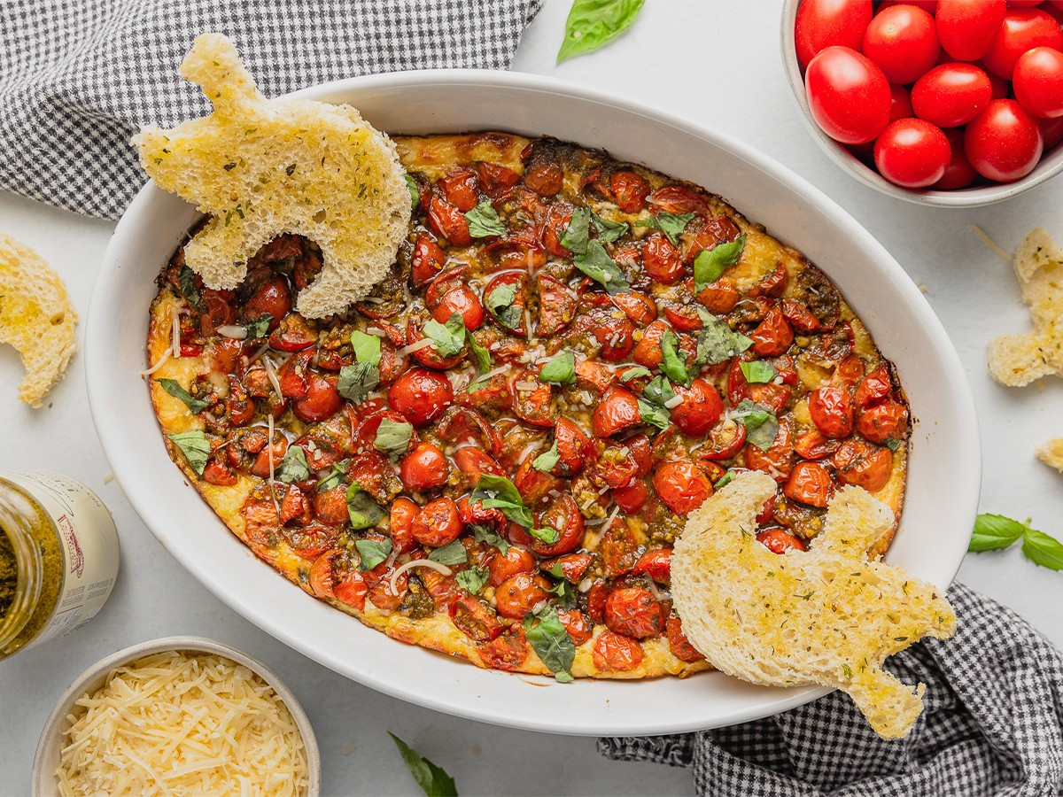 Melty Boo-Schetta Dip With Garlic-Toast Ghosts | Hy-Vee