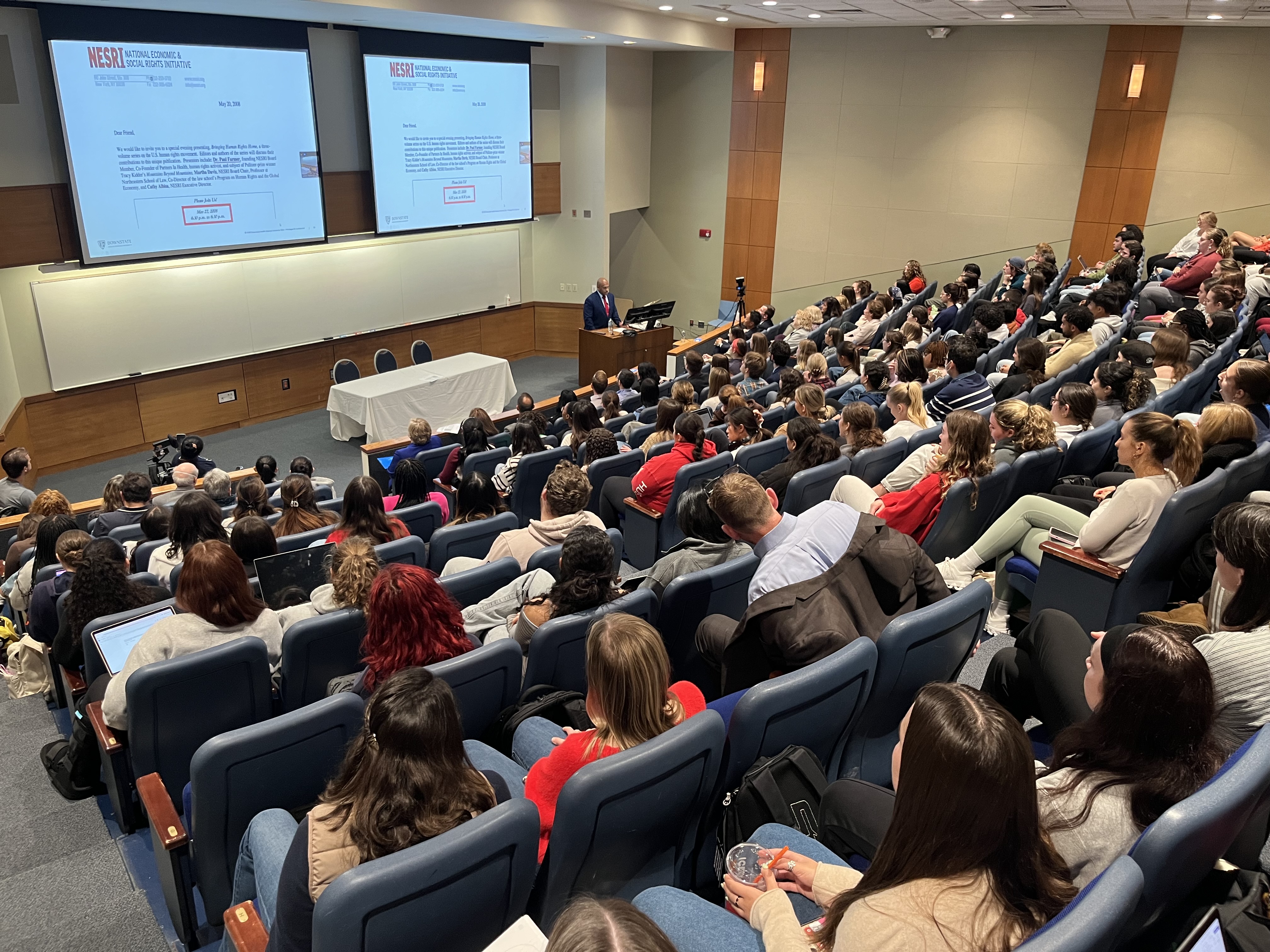 a large group at the library auditorium