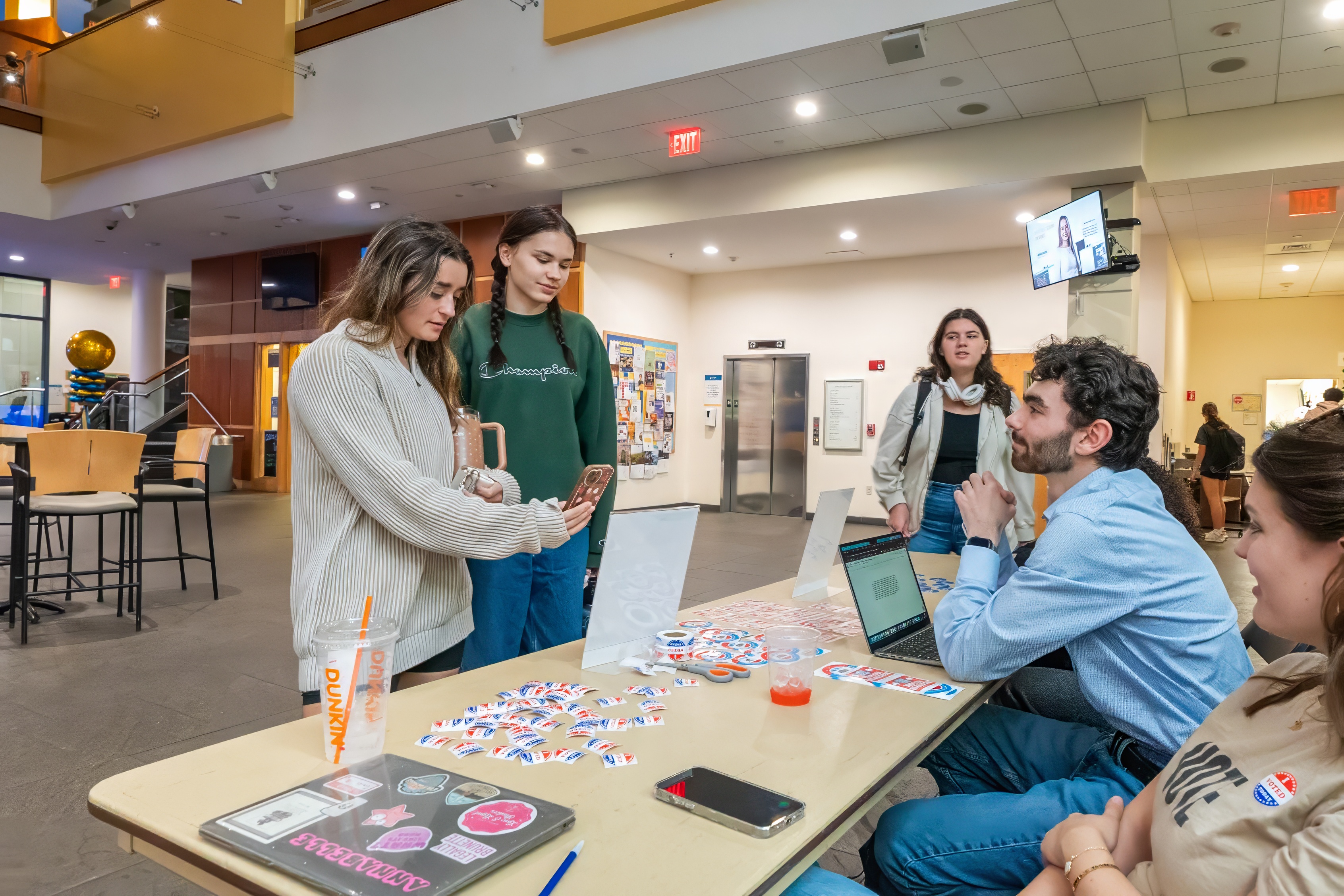 Students talking during a voter registration drive