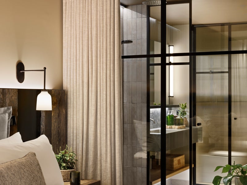 Bedroom with view of bathroom