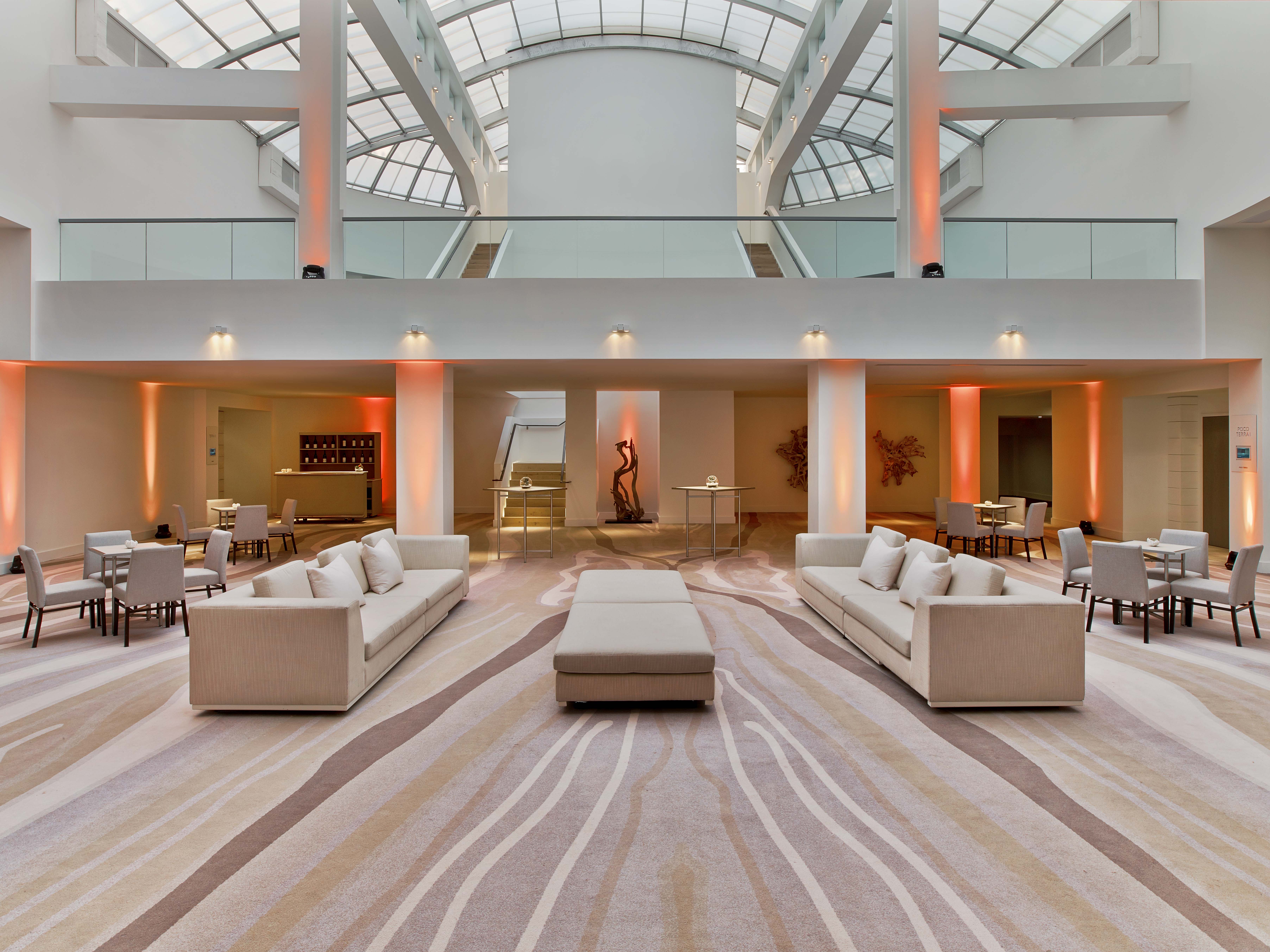 Atrium area with chairs and couches