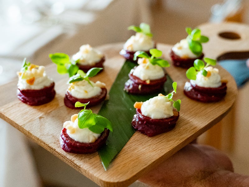 appetizer on a wood tray