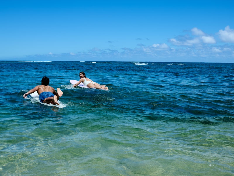 Friends Surfing