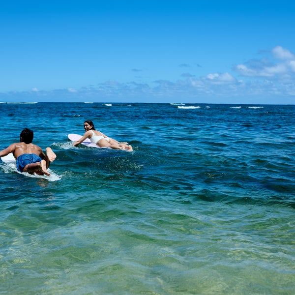 Friends Surfing