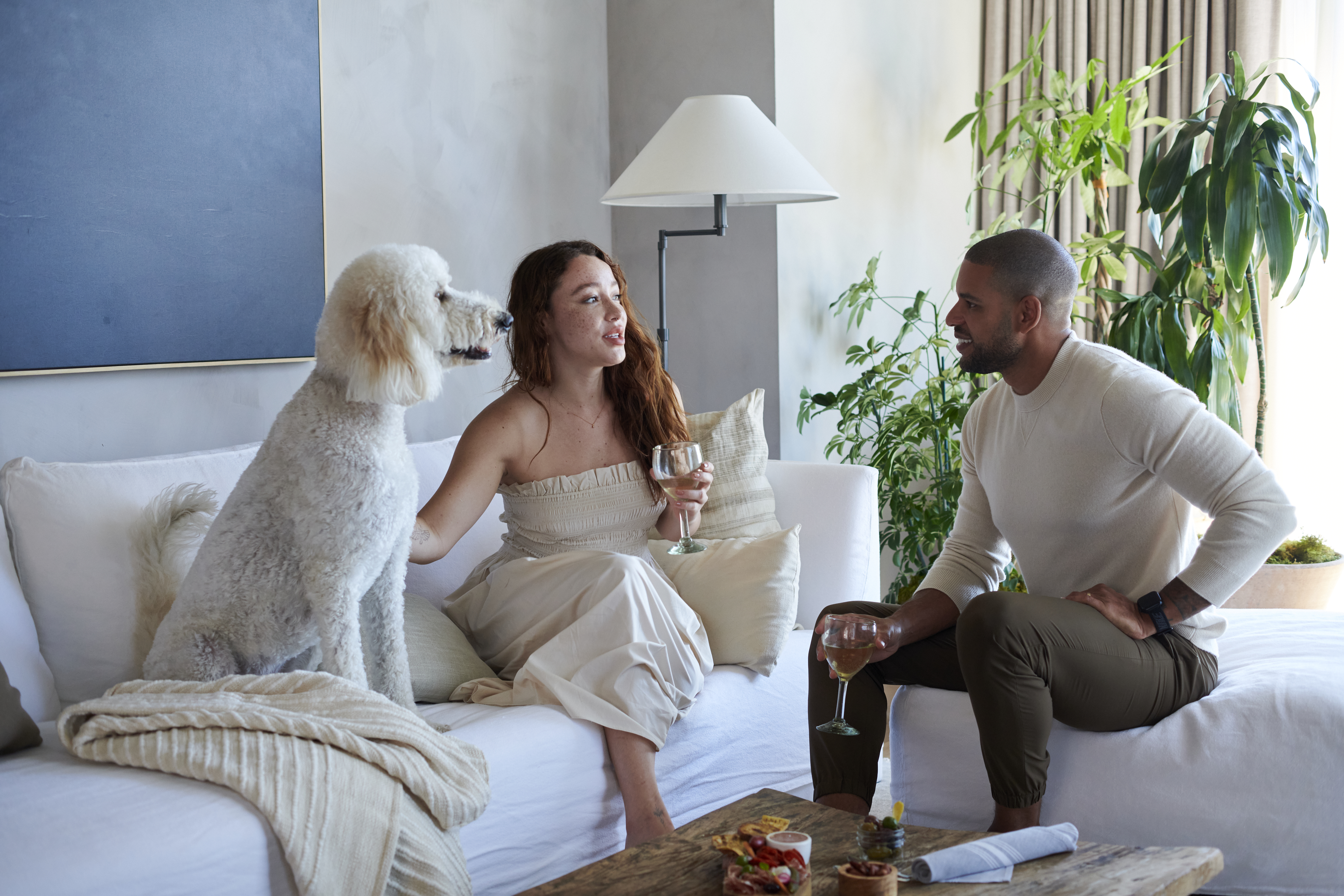 Two people having a drink and talking