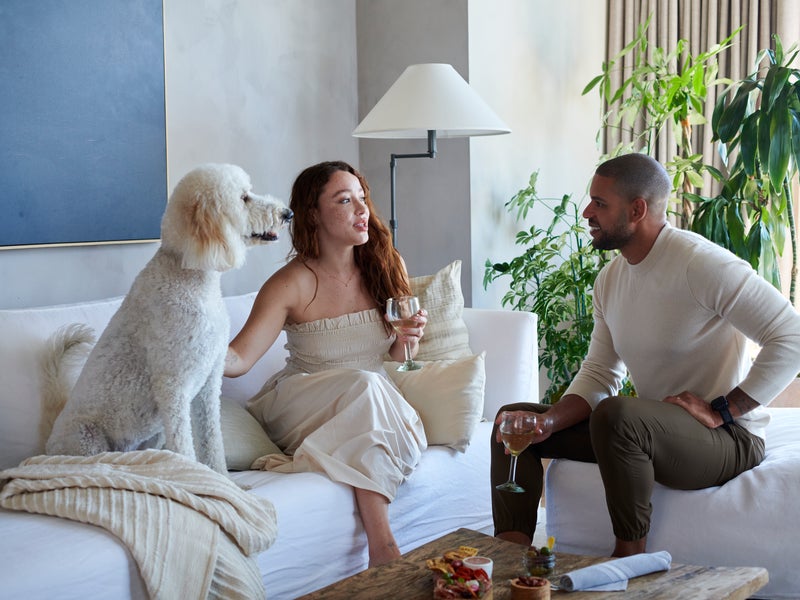 Two people having a drink and talking