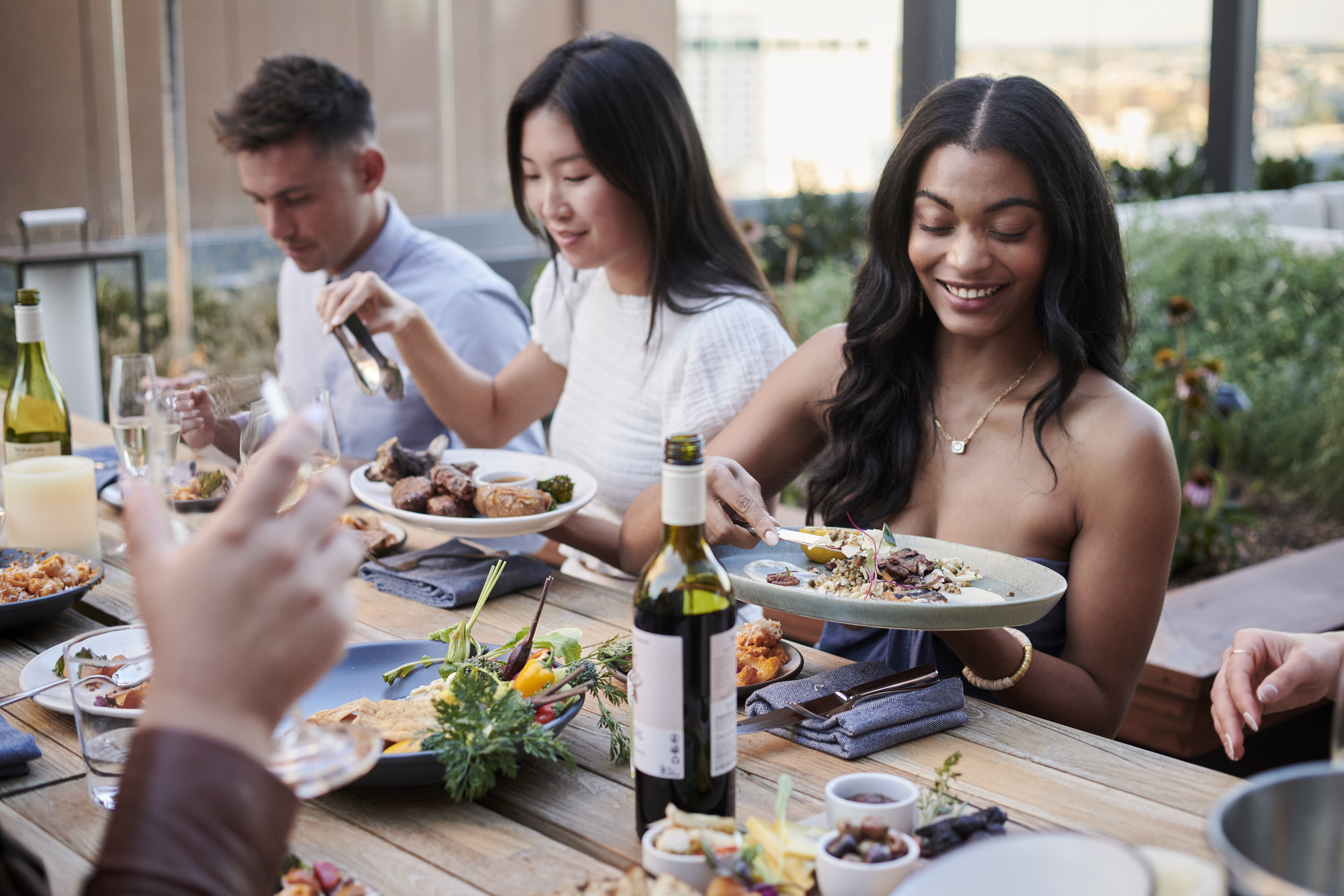 Group of people eating outdoors