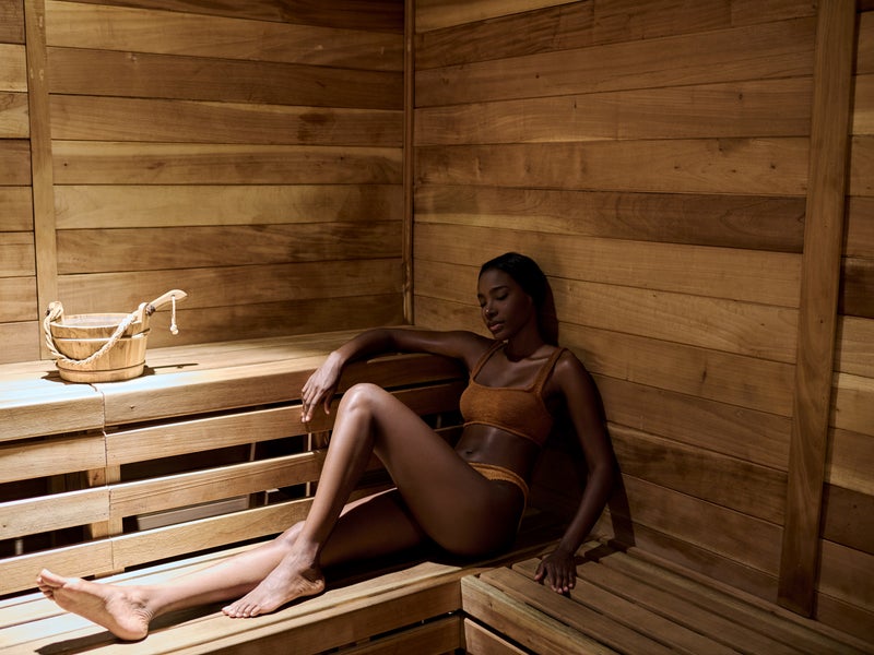 Woman in Bamford Wellness Spa Sauna