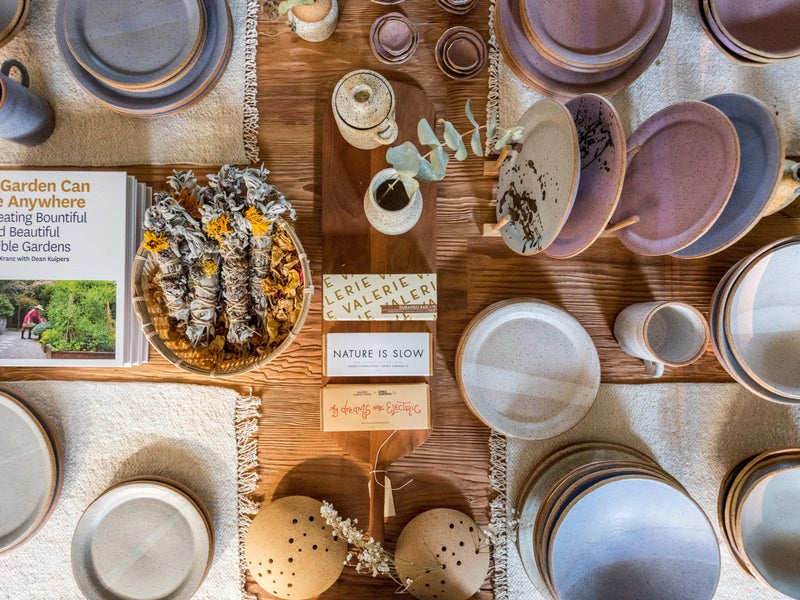 A display of plates and books