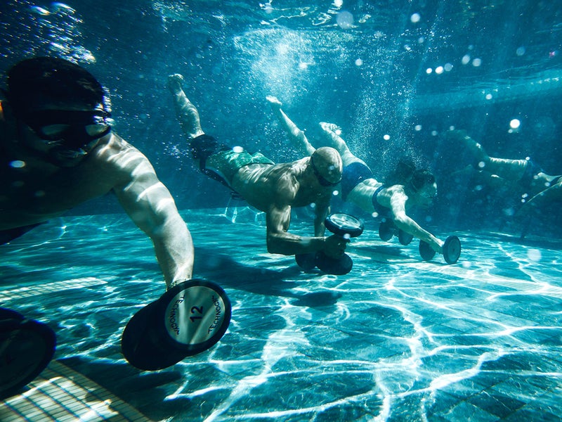 People working out underwater