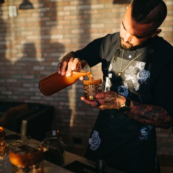 bartender pouring drink